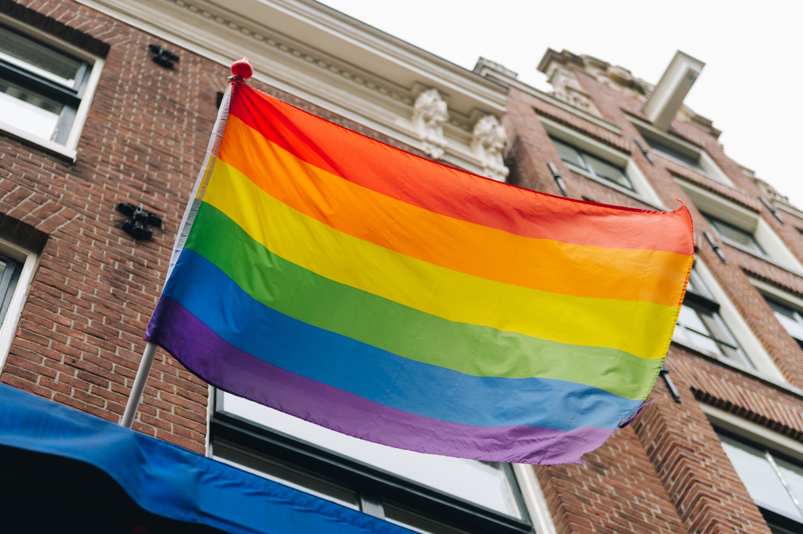Image of rainbow Pride flag waving in the wind