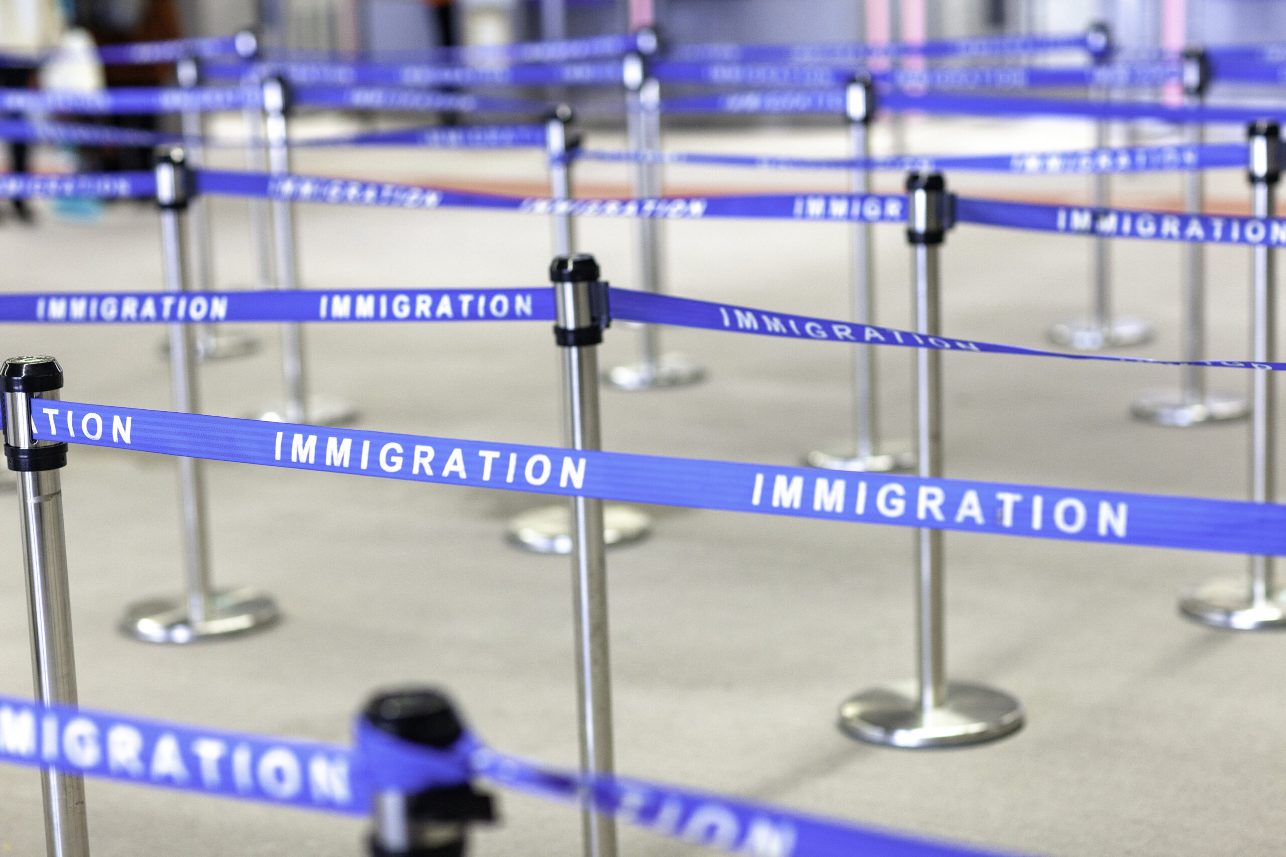 Image of blue Immigration entrance barriers at US airport