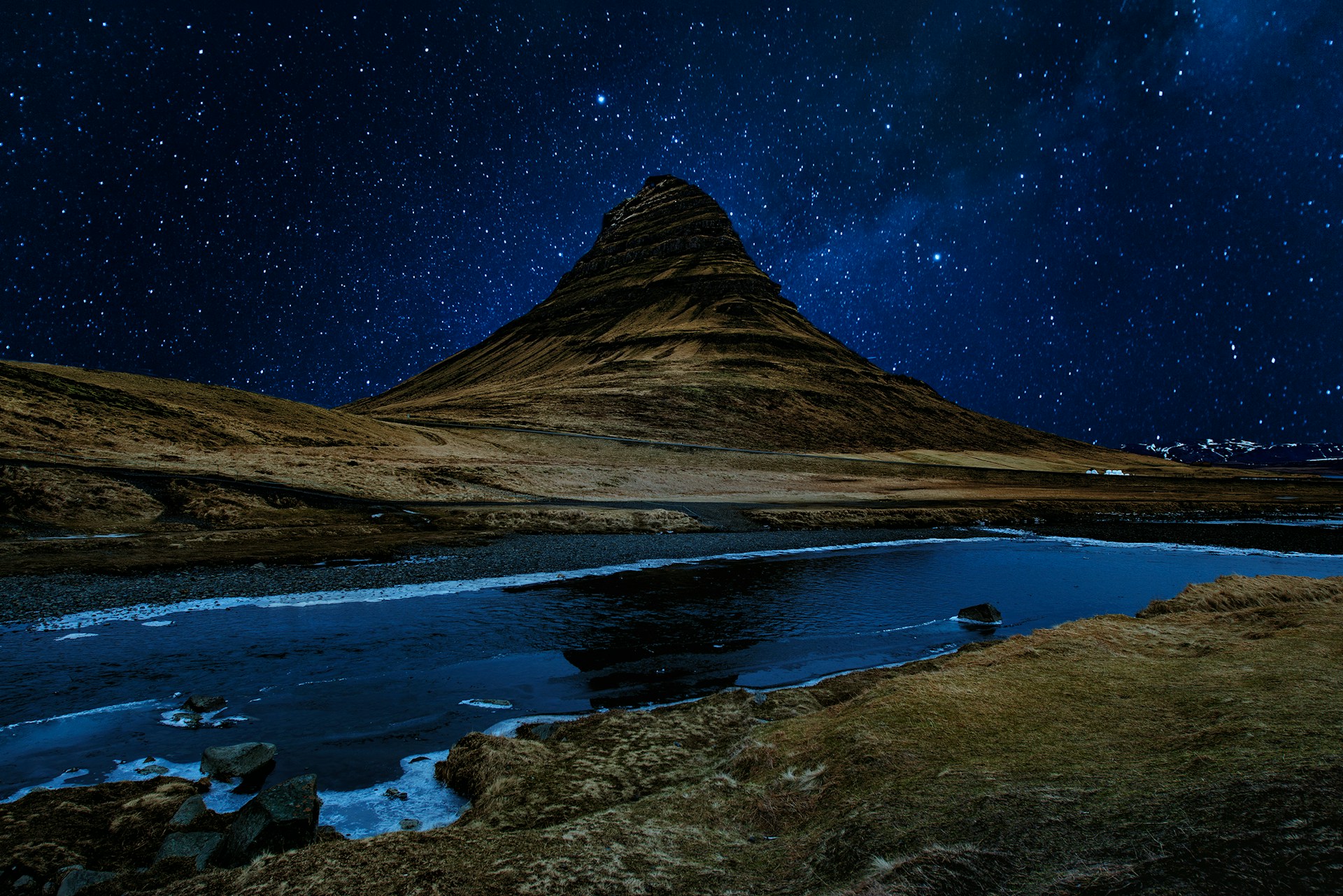 Milky Way Galaxy photographed over Kirkjufell mountain in Iceland - a best place to see the Milky Way