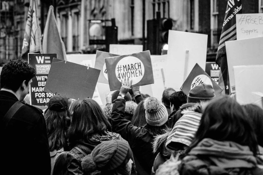 Women's rights campaigners in crowd