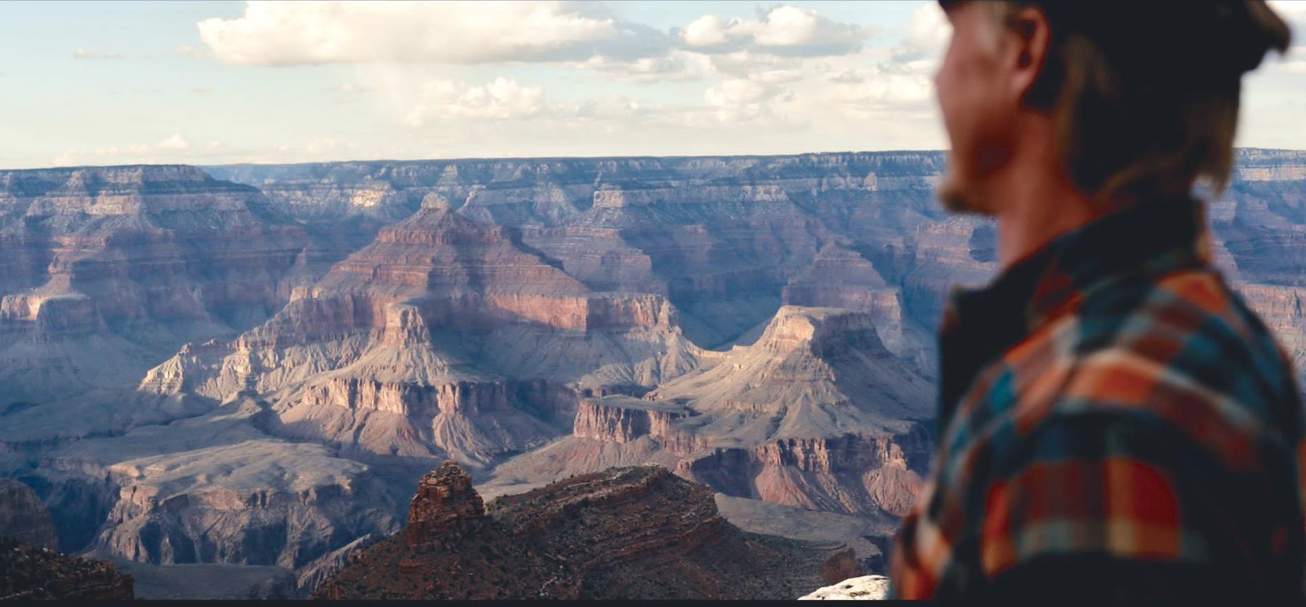 Canyon Tim looks out into the distance over Grand Canyon