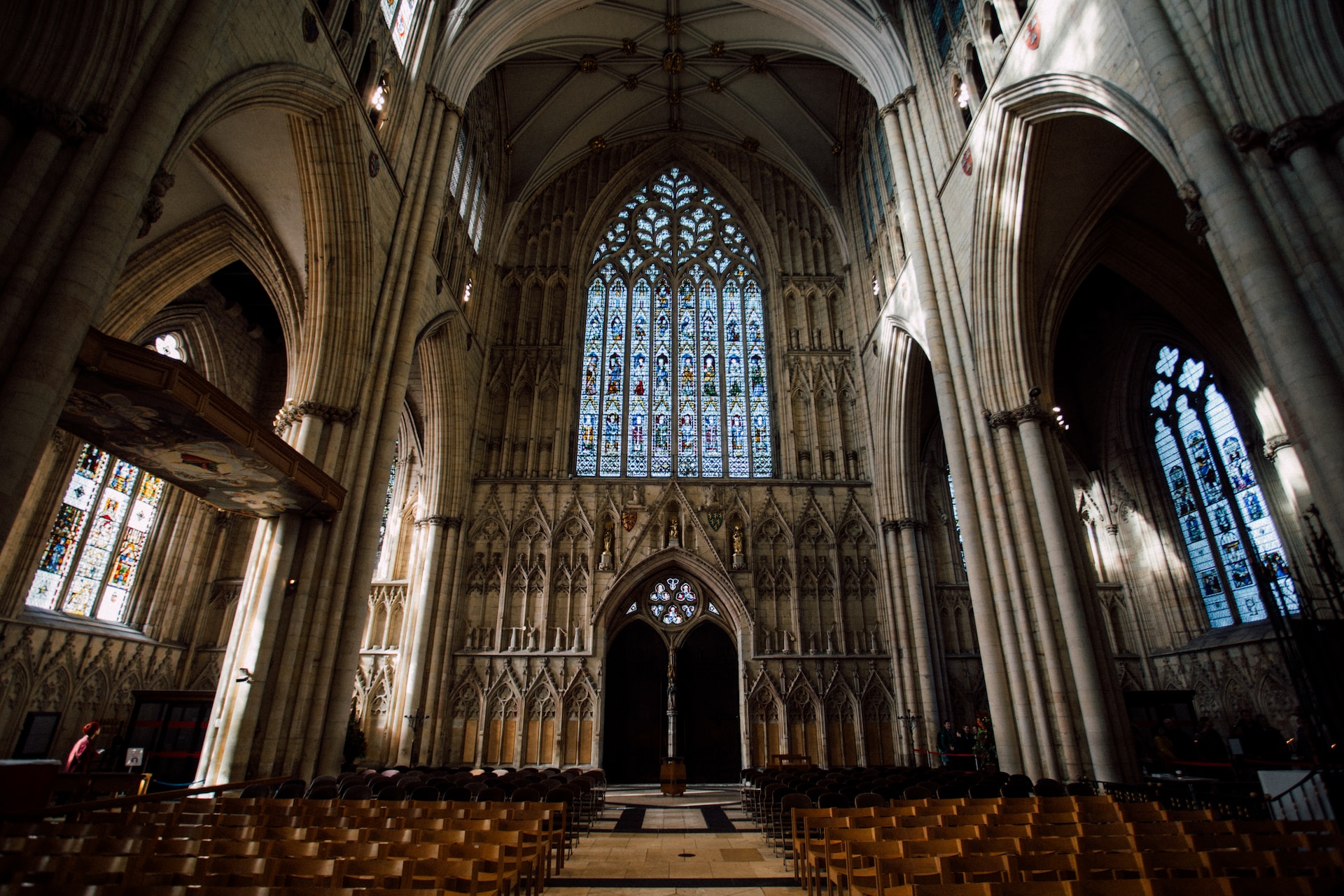 Photograph of the inside of York Minster, with its heart-shaped stained glass window