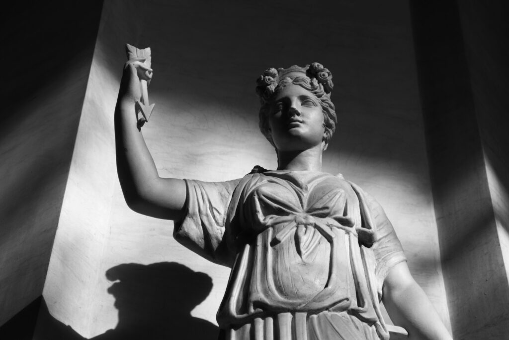 photo of female Roman statue in black and white