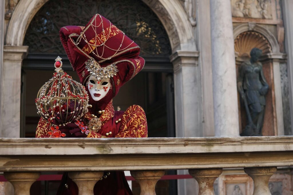 Person wearing an elaborate costume and mask for Venice Carnevale