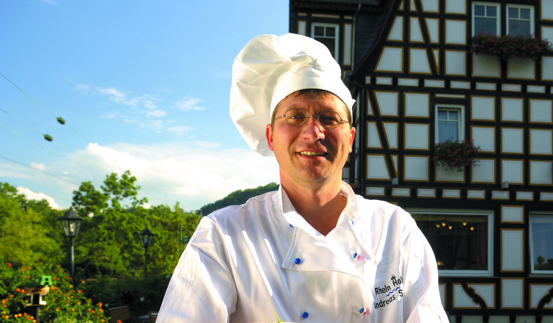 Andreas in front of his hotel in the Rhine Valley