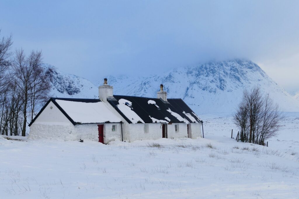 Photo of a building covered in snow in the Scottish Highlands